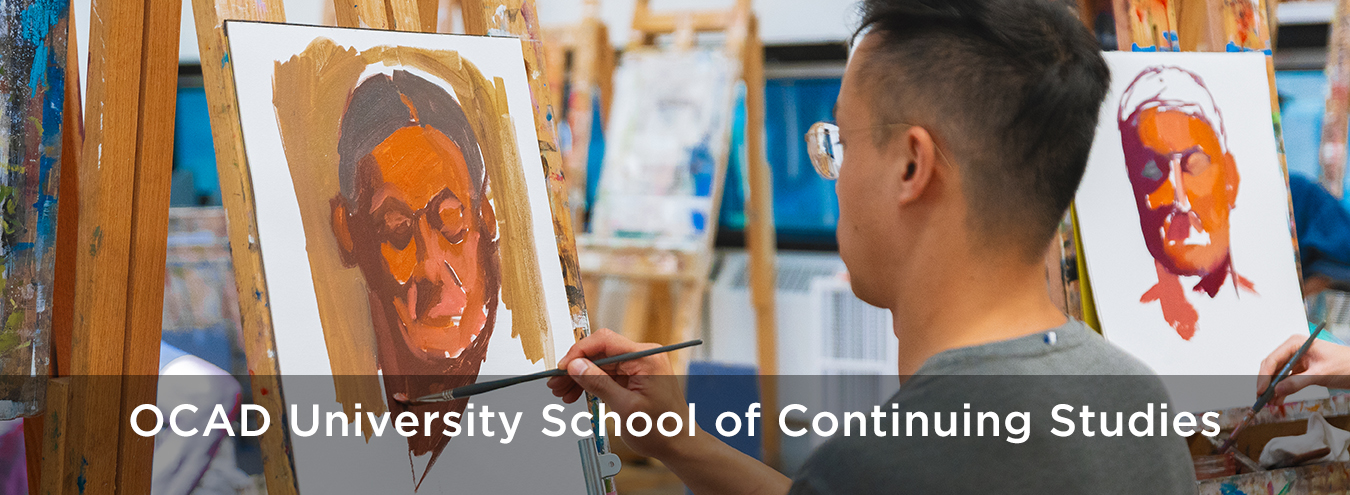 Photo of a student painting a portrait